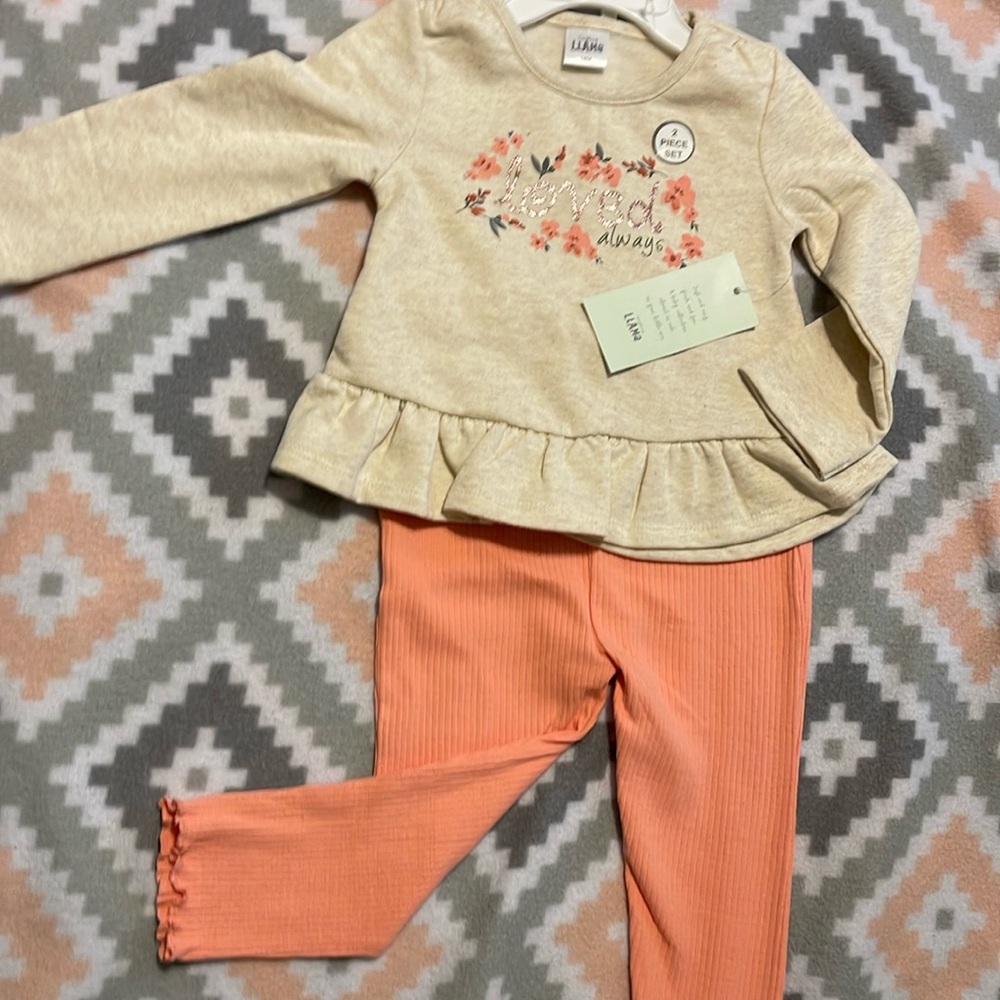 New with tags 12 month fit. Llama brand. Never worn.